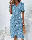 Women's floral midi dress featuring a wrap silhouette and V-neckline, perfect for summer wear; lightweight and comfortable fabric ideal for warm weather outings. 1