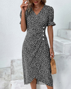 Women's floral midi dress featuring a wrap silhouette and V-neckline, perfect for summer wear; lightweight and comfortable fabric ideal for warm weather outings. 2