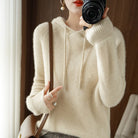 Women's cozy hoodie featuring a drawstring and ribbed cuffs, perfect for a relaxed fit in fall and winter. 0