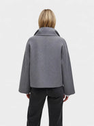 Women's wool-feel short coat featuring an oversized collar and stylish wrap-front design, perfect for smart-casual occasions. 1