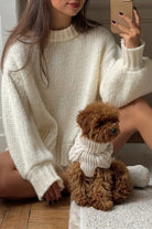 Women's classic crew neck jumper made from thick acrylic knit, perfect for layering in cooler weather. 5