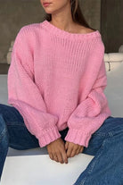 Women's classic crew neck jumper made from thick acrylic knit, perfect for layering in cooler weather. 8