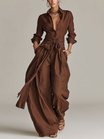 Women's jumpsuit featuring a stylish belt and shirt collar, crafted from a breathable cotton-linen blend, designed with long sleeves for versatility and comfort. 0