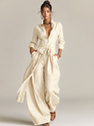 Women's jumpsuit featuring a stylish belt and shirt collar, crafted from a breathable cotton-linen blend, designed with long sleeves for versatility and comfort. 4