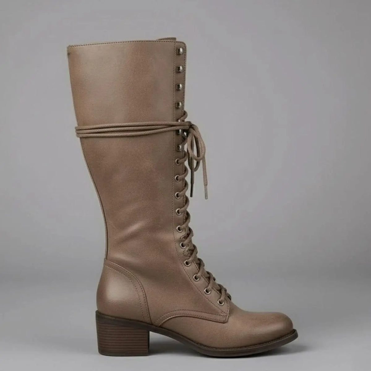 Women's black faux leather knee-high boots featuring a lace-up front, block heel, and stylish stud detail. 8