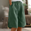 Women's linen blend shorts featuring an elastic waistband, designed for lightweight comfort and casual summer wear, complete with convenient pockets. 0