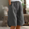 Women's linen blend shorts featuring an elastic waistband, designed for lightweight comfort and casual summer wear, complete with convenient pockets. 1