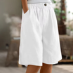 Women's linen blend shorts featuring an elastic waistband, designed for lightweight comfort and casual summer wear, complete with convenient pockets. 10