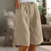 Women's linen blend shorts featuring an elastic waistband, designed for lightweight comfort and casual summer wear, complete with convenient pockets. 7