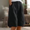 Women's linen blend shorts featuring an elastic waistband, designed for lightweight comfort and casual summer wear, complete with convenient pockets. 8