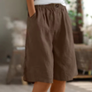 Women's linen blend shorts featuring an elastic waistband, designed for lightweight comfort and casual summer wear, complete with convenient pockets. 9