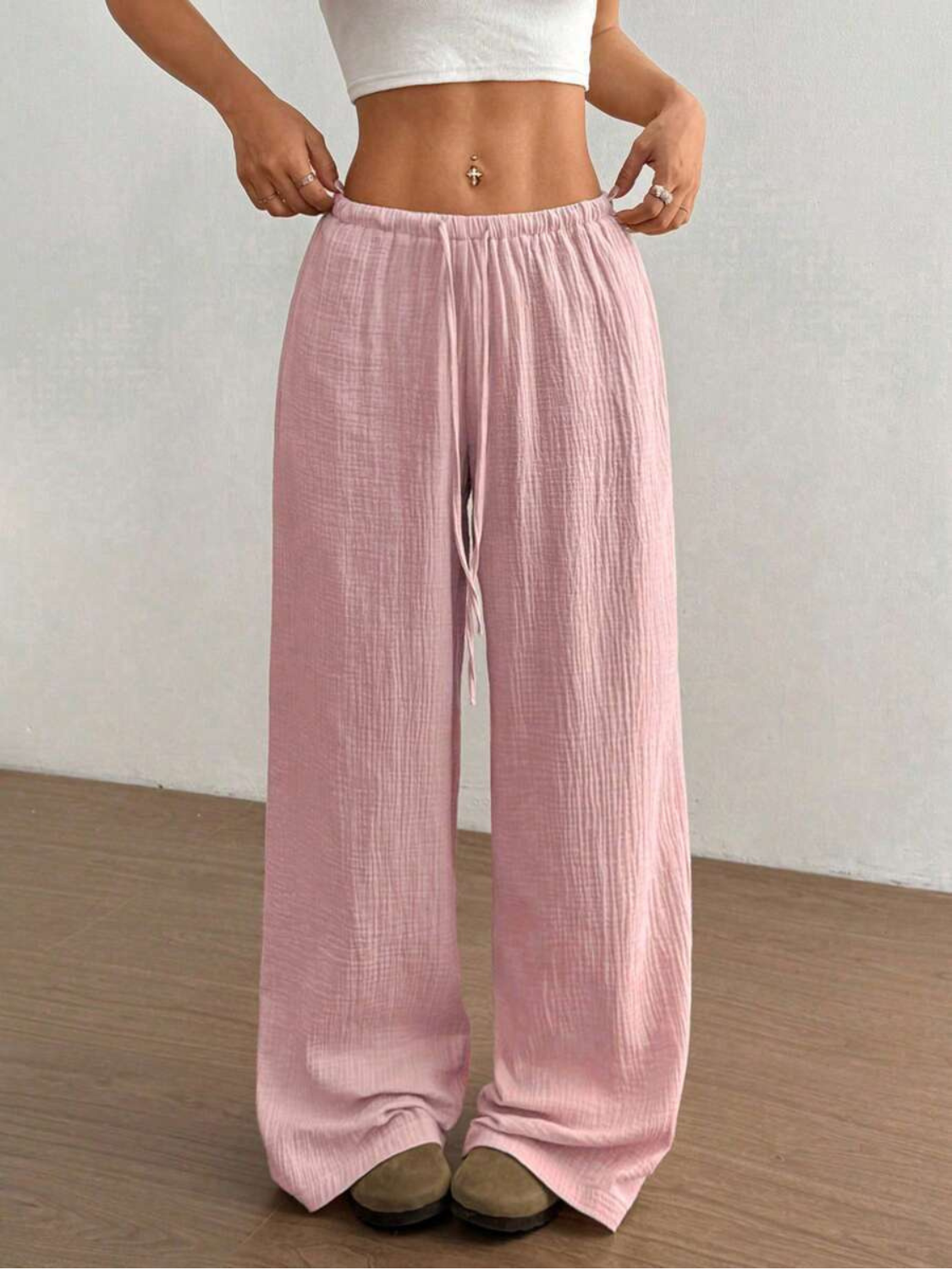 Women's linen wide leg pants featuring an adjustable drawstring, designed for casual lightweight comfort, perfect for summer outings. 0
