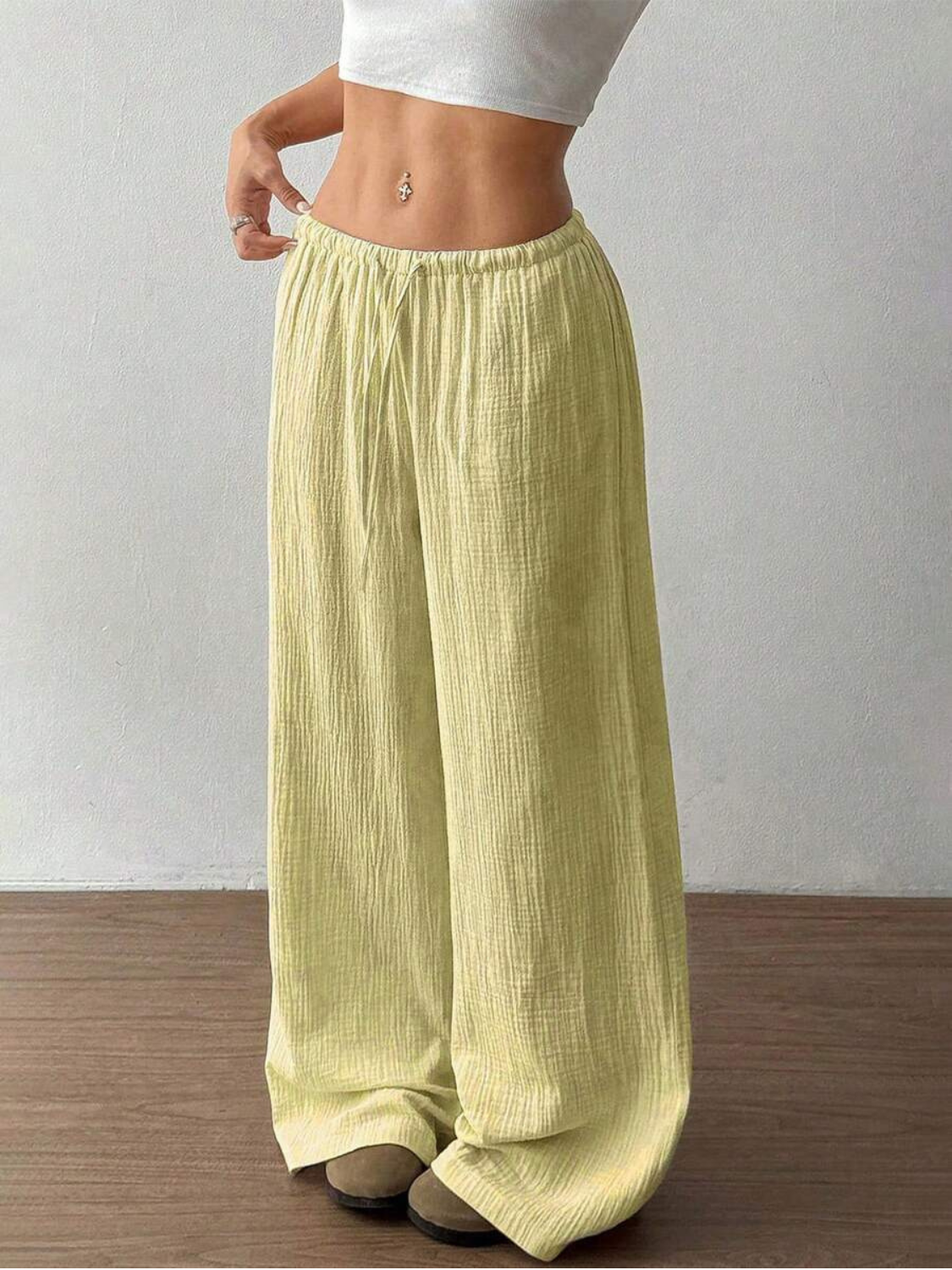 Women's linen wide leg pants featuring an adjustable drawstring, designed for casual lightweight comfort, perfect for summer outings. 3