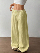 Women's linen wide leg pants featuring an adjustable drawstring, designed for casual lightweight comfort, perfect for summer outings. 3