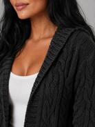 Women's long cardigan sweater featuring a cozy hood and functional pockets, designed with a chunky cable knit pattern and an open front for a stylish and comfortable look. 5