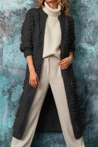 Women's long cardigan featuring a cozy open front design, stylish bobble knit texture, and practical pockets, available in eight vibrant colors. 0