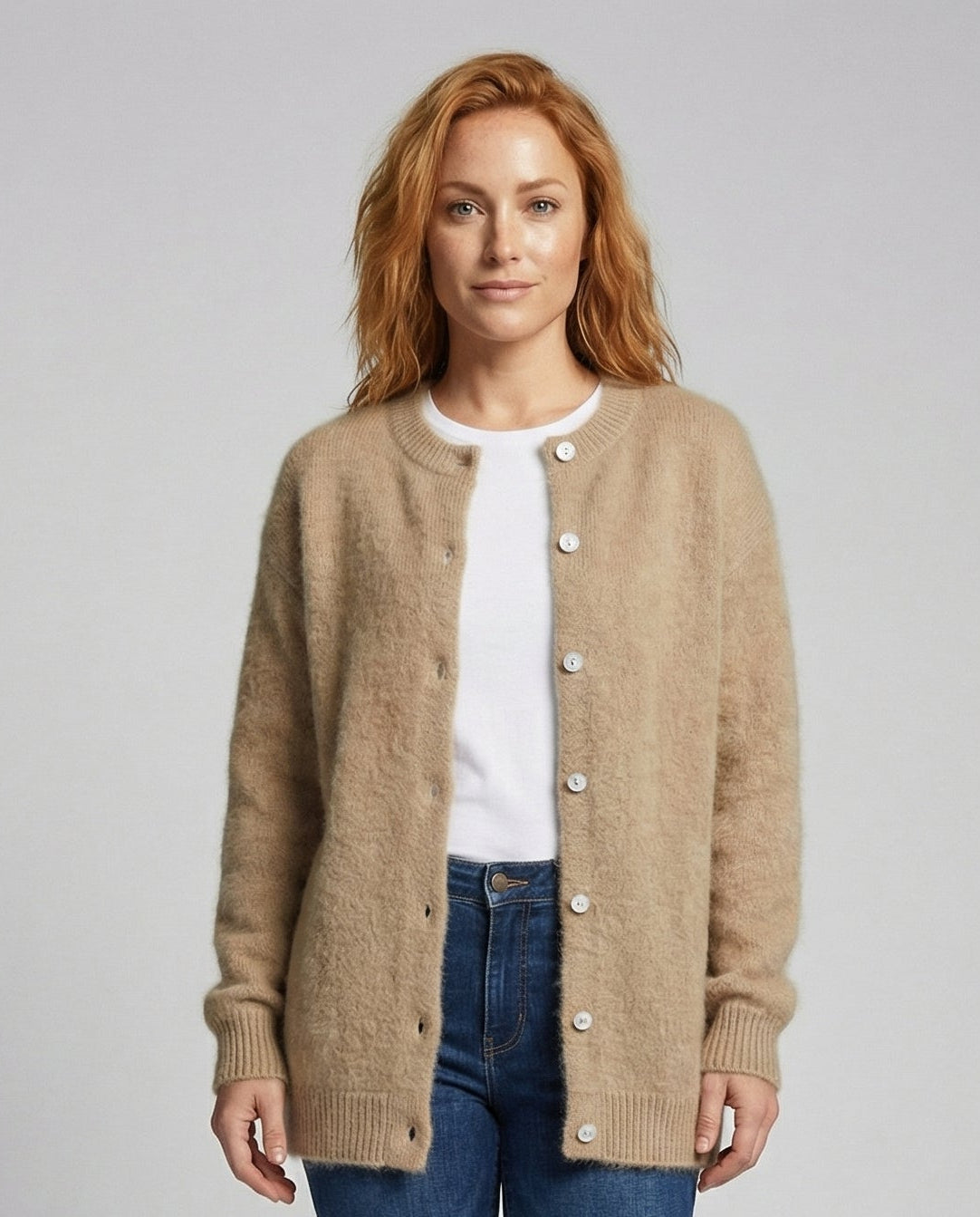 Women's long black cardigan featuring a button front design, crafted from soft brushed knit for comfort and style. 1
