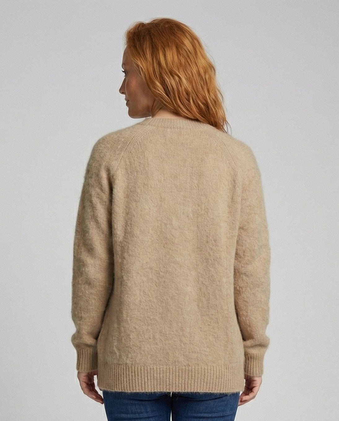 Women's long black cardigan featuring a button front design, crafted from soft brushed knit for comfort and style. 3