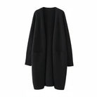 Women's long black cardigan with pockets, featuring a soft knit fabric and relaxed fit, perfect for layering and casual wear. 0
