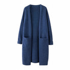 Women's long black cardigan with pockets, featuring a soft knit fabric and relaxed fit, perfect for layering and casual wear. 1