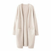Women's long black cardigan with pockets, featuring a soft knit fabric and relaxed fit, perfect for layering and casual wear. 3