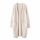 Women's long black cardigan with pockets, featuring a soft knit fabric and relaxed fit, perfect for layering and casual wear. 3