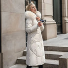 Women's long down puffer coat with high collar, designed for lightweight insulation and warmth, perfect for winter wear. 0