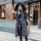 Women's long down puffer coat with high collar, designed for lightweight insulation and warmth, perfect for winter wear. 1