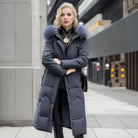 Women's long down puffer coat with high collar, designed for lightweight insulation and warmth, perfect for winter wear. 10