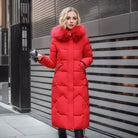 Women's long down puffer coat with high collar, designed for lightweight insulation and warmth, perfect for winter wear. 11