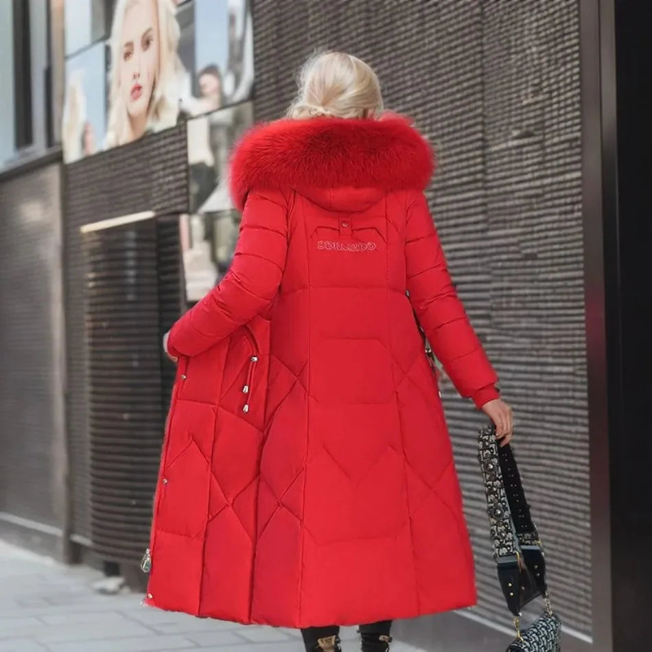 Women's long down puffer coat with high collar, designed for lightweight insulation and warmth, perfect for winter wear. 3