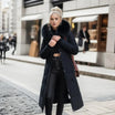 Women's long down puffer coat with high collar, designed for lightweight insulation and warmth, perfect for winter wear. 5