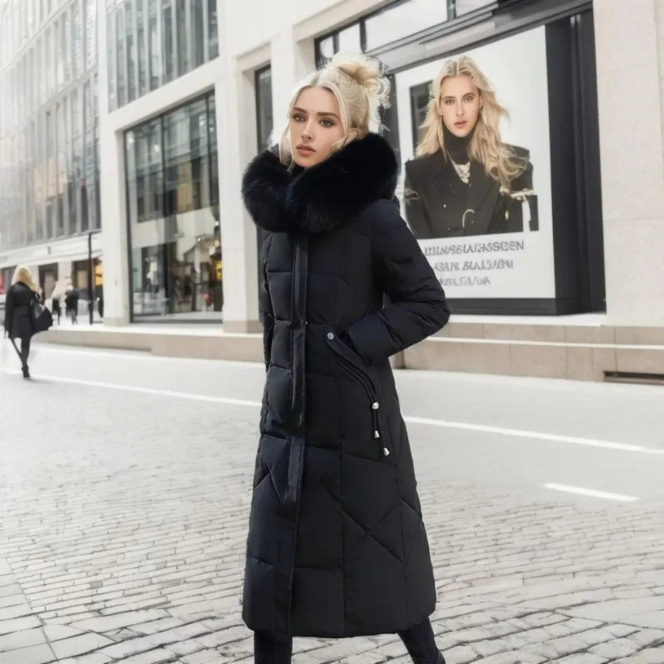 Women's long down puffer coat with high collar, designed for lightweight insulation and warmth, perfect for winter wear. 6