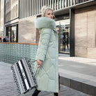 Women's long down puffer coat with high collar, designed for lightweight insulation and warmth, perfect for winter wear. 8