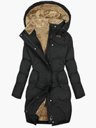 Women's long winter coat featuring a stylish faux fur hood and warming lining, designed for elegance and comfort in cold weather. 1