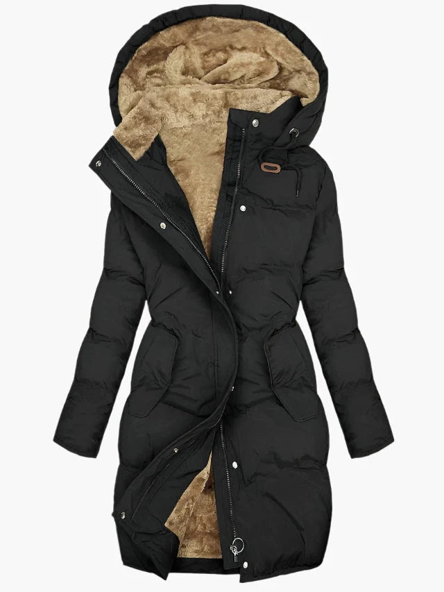 Women's long winter coat featuring a stylish faux fur hood and warming lining, designed for elegance and comfort in cold weather. 1