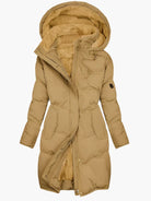 Women's long winter coat featuring a stylish faux fur hood and warming lining, designed for elegance and comfort in cold weather. 2