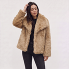 Women's longline faux fur coat featuring an oversized collar and a relaxed open-front design, perfect for stylish winter wear. 9