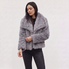 Women's longline faux fur coat featuring an oversized collar and a relaxed open-front design, perfect for stylish winter wear. 5