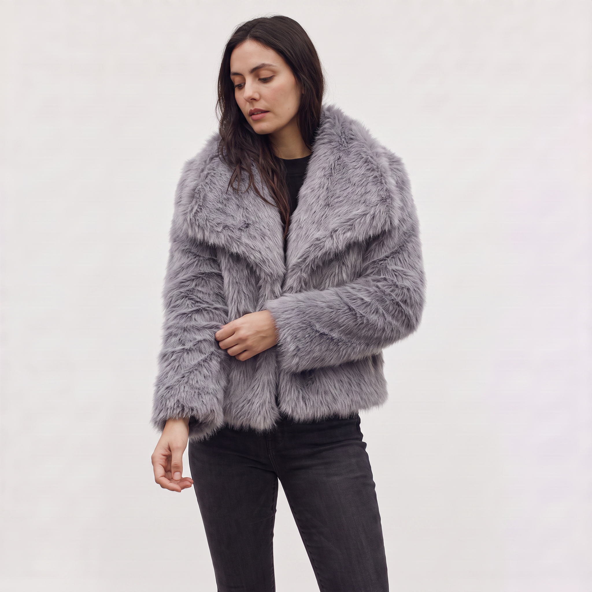 Women's longline faux fur coat featuring an oversized collar and a relaxed open-front design, perfect for stylish winter wear. 5