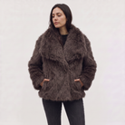 Women's longline faux fur coat featuring an oversized collar and a relaxed open-front design, perfect for stylish winter wear. 6