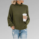 Women's loose knit sweater for winter, featuring a soft and cozy pullover design in a casual style, perfect for staying warm and fashionable. 1