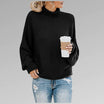 Women's loose knit sweater for winter, featuring a soft and cozy pullover design in a casual style, perfect for staying warm and fashionable. 2