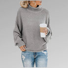 Women's loose knit sweater for winter, featuring a soft and cozy pullover design in a casual style, perfect for staying warm and fashionable. 4
