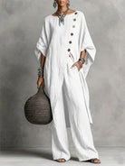 Women's vintage-inspired loungewear set featuring a batwing sleeve tunic and wide-leg pants, perfect for casual relaxation and comfort. 0