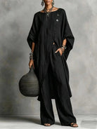Women's vintage-inspired loungewear set featuring a batwing sleeve tunic and wide-leg pants, perfect for casual relaxation and comfort. 9