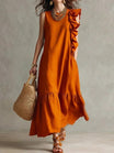 Women's sleeveless maxi dress with ruffle hem in lightweight fabric, perfect for summer boho style, featuring a flowy silhouette and vibrant colors. 0