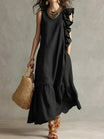Women's sleeveless maxi dress with ruffle hem in lightweight fabric, perfect for summer boho style, featuring a flowy silhouette and vibrant colors. 2