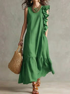 Women's sleeveless maxi dress with ruffle hem in lightweight fabric, perfect for summer boho style, featuring a flowy silhouette and vibrant colors. 4
