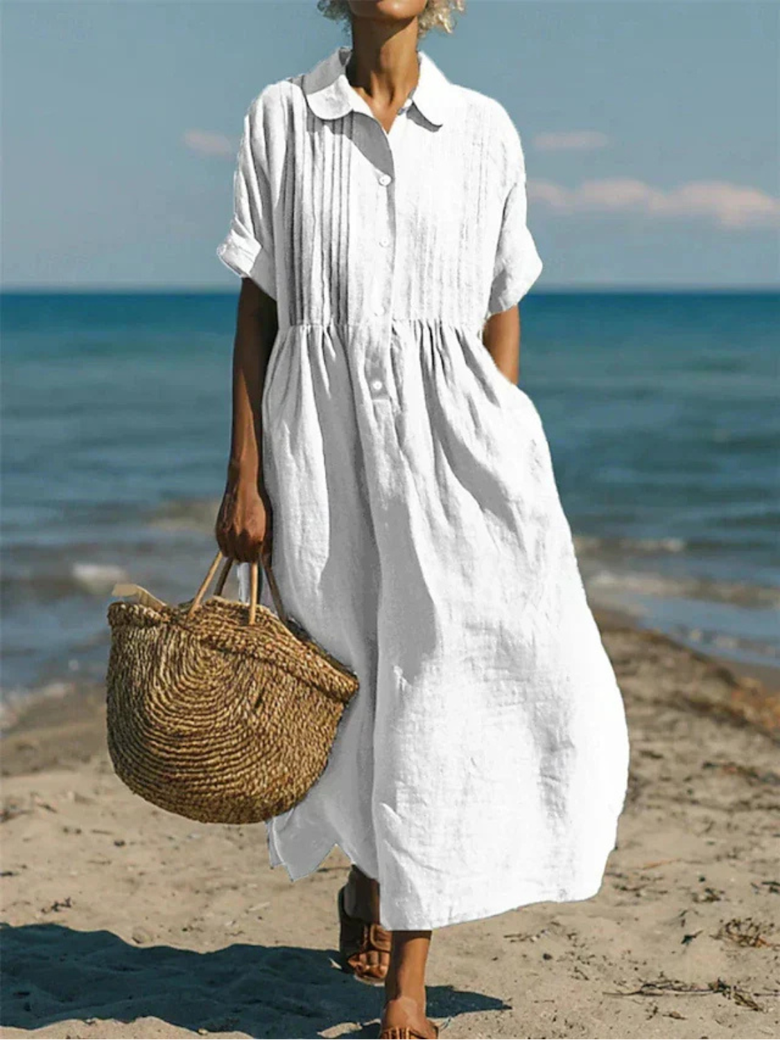 Women's maxi dress featuring a smocked waist and pintuck detailing, made from an elegant linen blend, perfect for summer occasions. 0